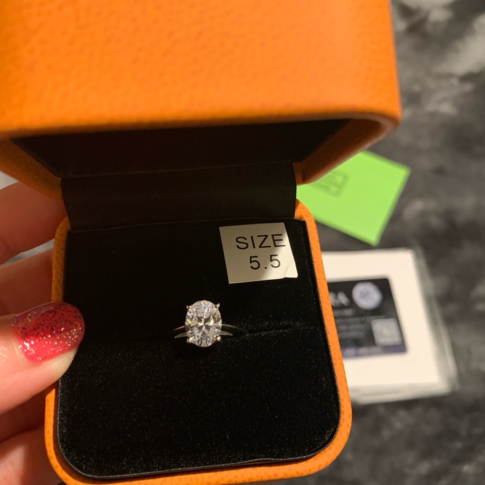 Vosali Moissanite ring. 2 cts oval with authentic GRA certificates